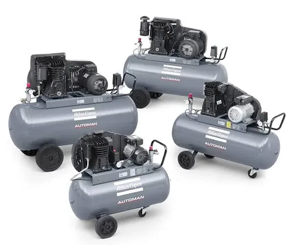 Four Atlas Copco Automan belt-driven piston compressors in grey